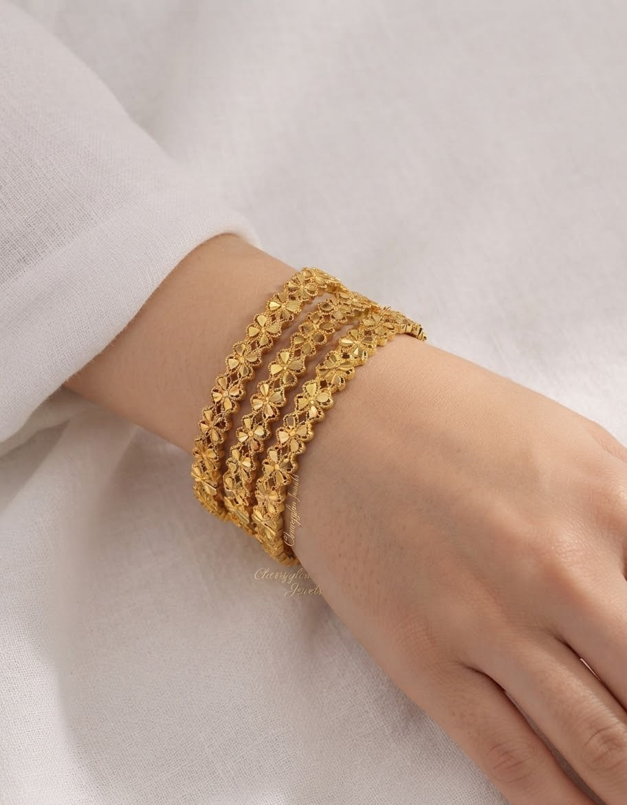 Exquisite Gold Ball Bangle Set